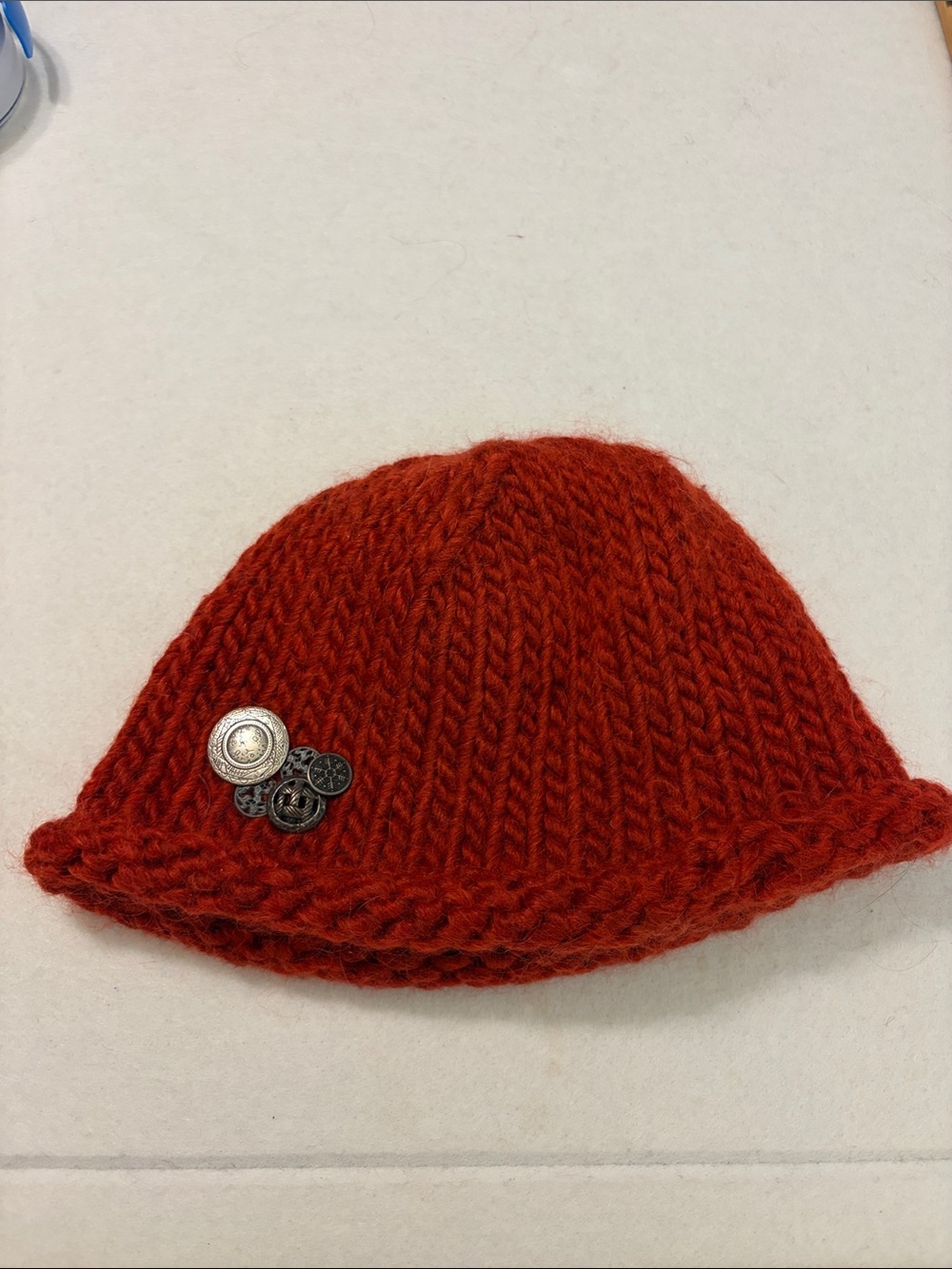 Handmade red beanie with metal buttons